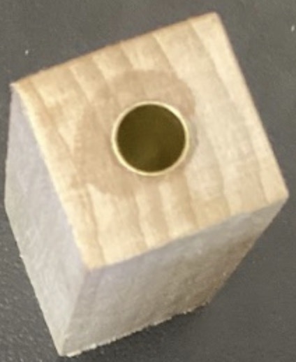 Drilled holes with brass tubes